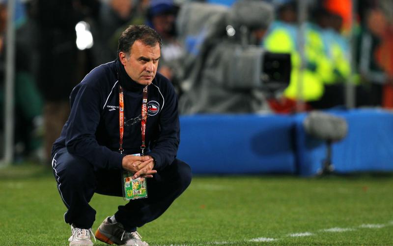 JOHANNESBURG, SOUTH AFRICA - JUNE 28: Marcelo Bielsa head coach of Chile looks on during the 2010 FIFA World Cup South Africa Round of Sixteen match between Brazil and Chile at Ellis Park Stadium on June 28, 2010 in Johannesburg, South Africa. (Photo by Clive Rose/Getty Images)