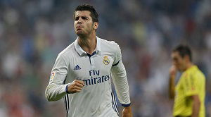 Real Madrid's Alvaro Morata celebrates after scoring the opening goal against Celta Vigo during the Spanish La Liga soccer match between Real Madrid and Celta at the Santiago Bernabeu stadium in Madrid, Saturday, Aug. 27, 2016. (AP Photo/Francisco Seco)
