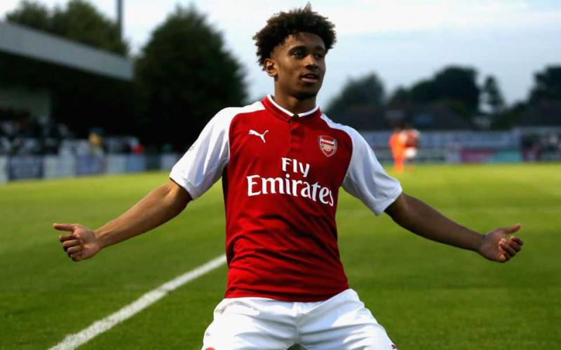 BOREHAMWOOD, ENGLAND - AUGUST 25: Reiss Nelson of Arsenal celebrates after scoring his sides first goal during the Premier League 2 match between Arsenal and Liverpool at Meadow Park on August 25, 2017 in Borehamwood, England. (Photo by Alex Pantling/Getty Images)