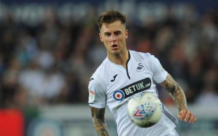 SWANSEA, WALES - AUGUST 21: Swansea City's Joe Rodon during the Sky Bet Championship match between City and Leeds United at Liberty Stadium on August 21, 2018 in Swansea, Wales. (Photo by Kevin Barnes - CameraSport via Getty Images)