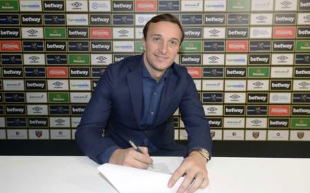 Mark Noble of West Ham United signs a contract extension at Rush Green Training Ground, December 11th, 2018 in London, England. (Photo by James Griffiths/West Ham United)