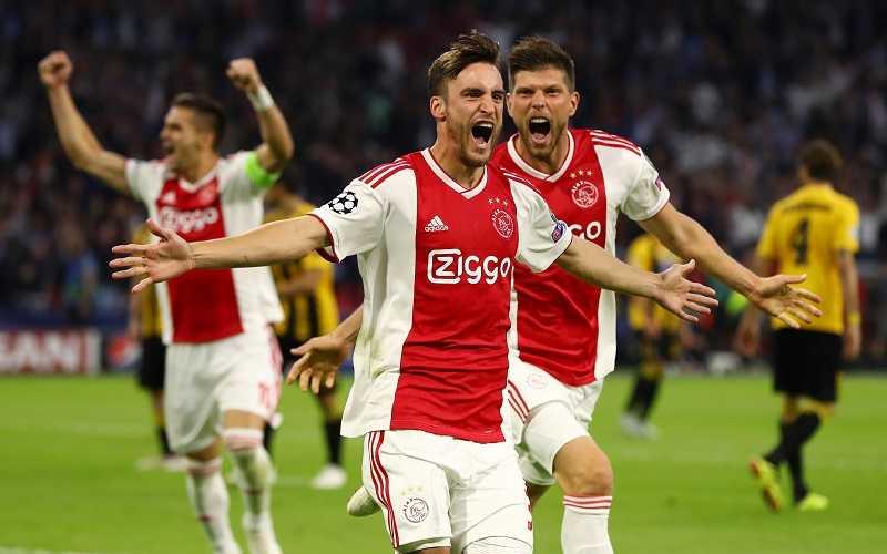 AMSTERDAM, NETHERLANDS - SEPTEMBER 19: Nicolas Tagliafico of Ajax celebrates after scoring his team's first goal during the Group E match of the UEFA Champions League between Ajax and AEK Athens at Johan Cruyff Arena on September 19, 2018 in Amsterdam, Netherlands. (Photo by Dean Mouhtaropoulos/Getty Images)