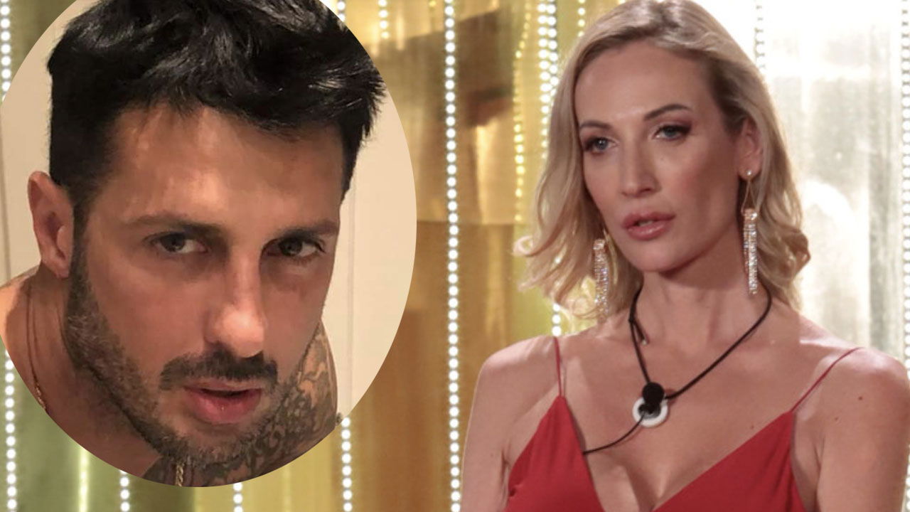 Fabrizio Corona dietro a Valentina Nulli Augusti