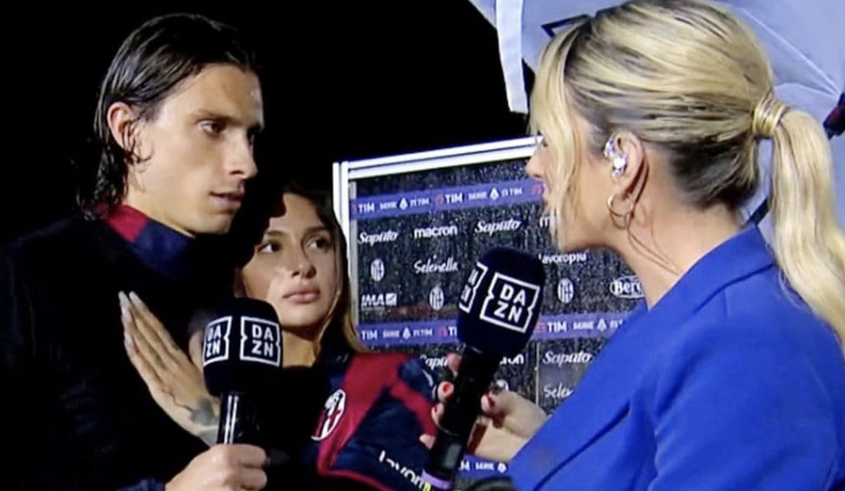 Calafiori: la fidanzata corre a baciarlo e marca il territorio durante l’intervista con la giornalista di DAZN article-post