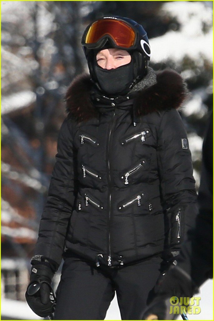 Madonna bundled and ready for skiing wearing all black **USA ONLY**