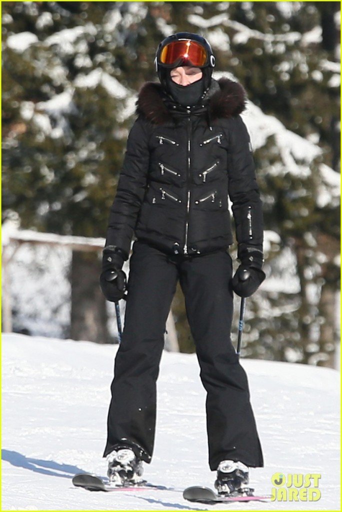 Madonna bundled and ready for skiing wearing all black **USA ONLY**