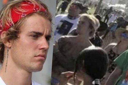 justin bieber pugni pugno uomo donna collo
