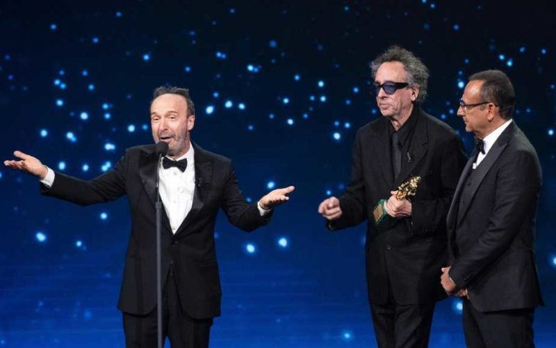 US film director Tim Burton (C) with Italian film director and actor Roberto Benigni and Italian presenter Carlo Conti (R) on stage in the occasion of the 64th edition of the ?David di Donatello Awards? in Rome, Italy, 27 March 2019. The David di Donatello award is a film prize presented annually to honor the best of Italian and foreign motion picture productions.
ANSA/CLAUDIO PERI