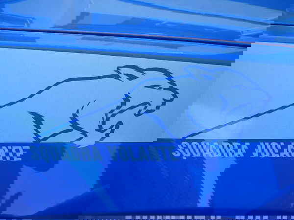 I nomadi con la volante della Polizia