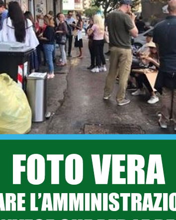 La pizza sul cassonetto