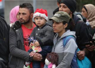 Migranti arrivo Germania