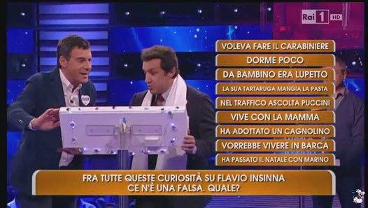 L’Eredità: Carlo Conti sostituito da Flavio Insinna, è subito polemica.