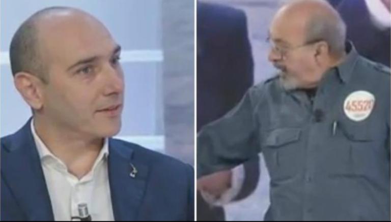 Vauro invita il leghista ad alzarsi in piedi per Segre, ma lui dice che «non è rispettoso per gli italiani»