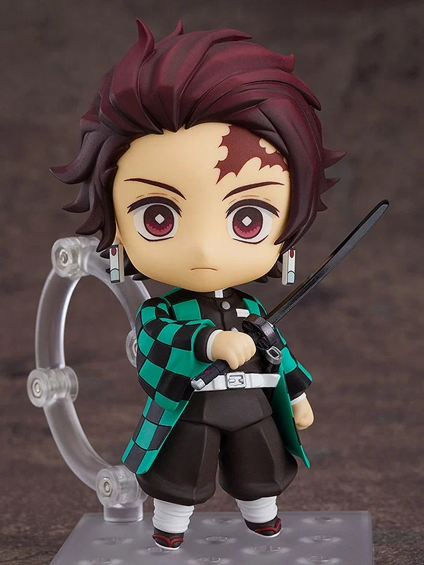 Nendoroid Tanjiro Kamado 1193 di Demon Slayer con spada Nichirin e haori a scacchi verdi e neri.