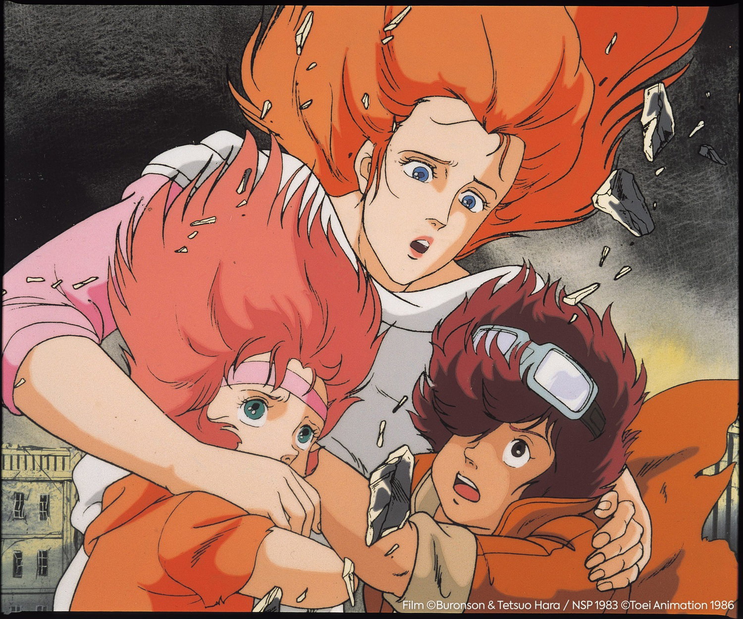 Julia protegge Lynn e Bart in una scena del film di Ken il Guerriero del 1986
