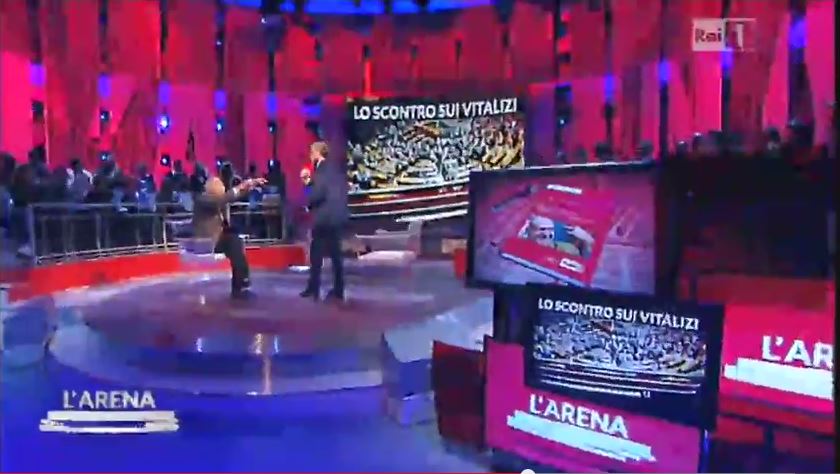 Giletti litiga con Capanna a L'Arena e sbatte il suo libro per terra article-post