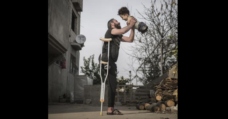 Mustafa Al-Nazzal Foto padre figlio Siria