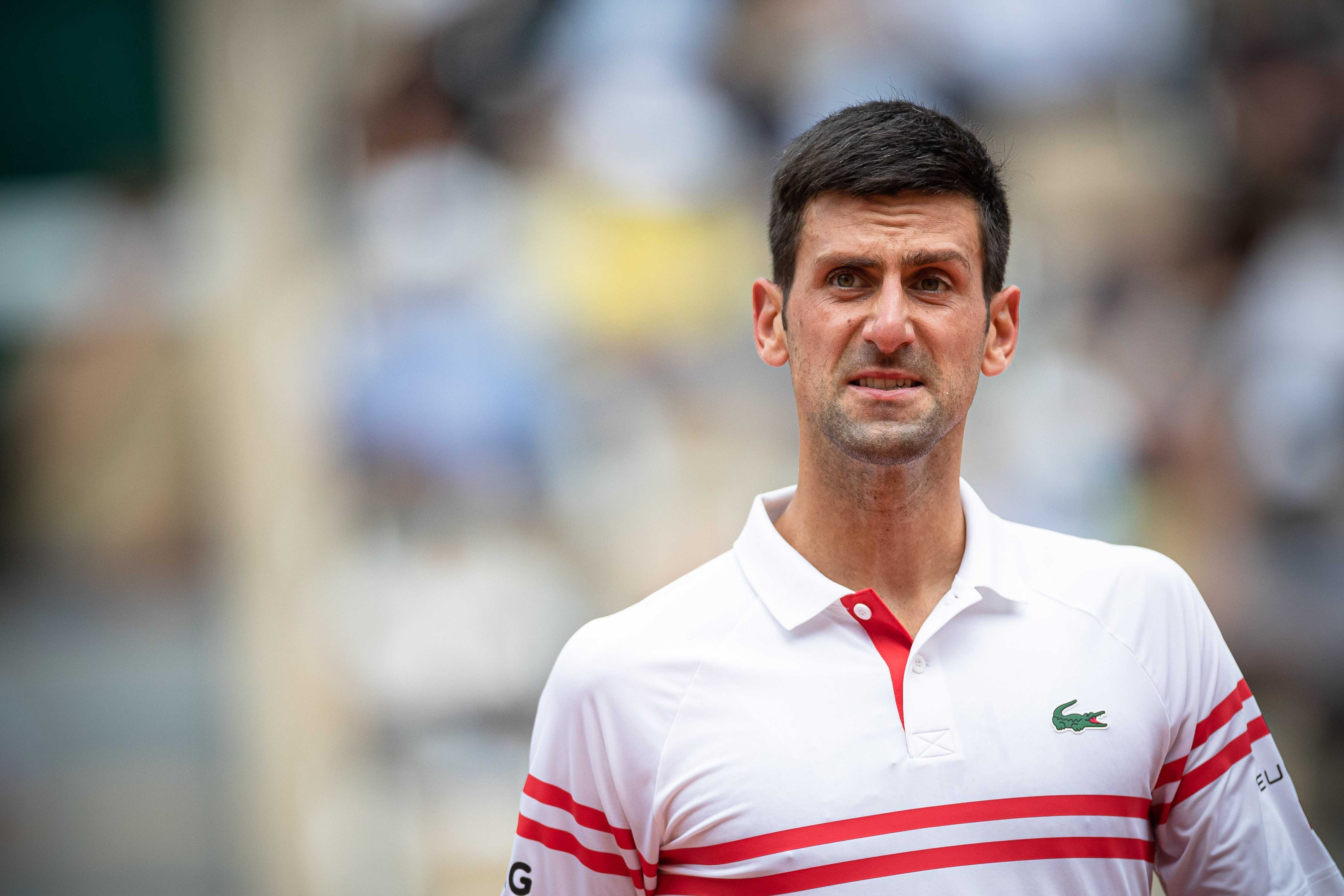 djokovic vaccinato arrestato migranti wimbledon