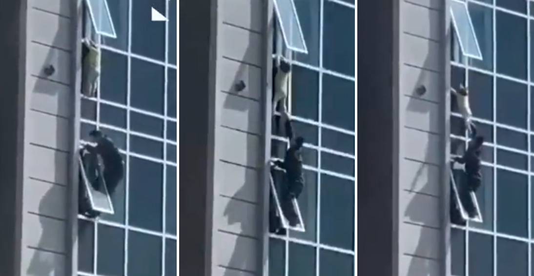 kazakistan uomo salva bambina finestra