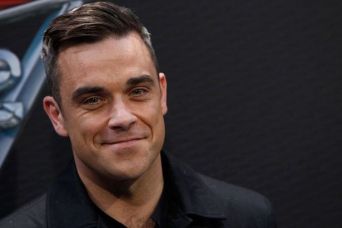 Under the Radar: il nuovo album a sorpresa di Robbie Williams article-post