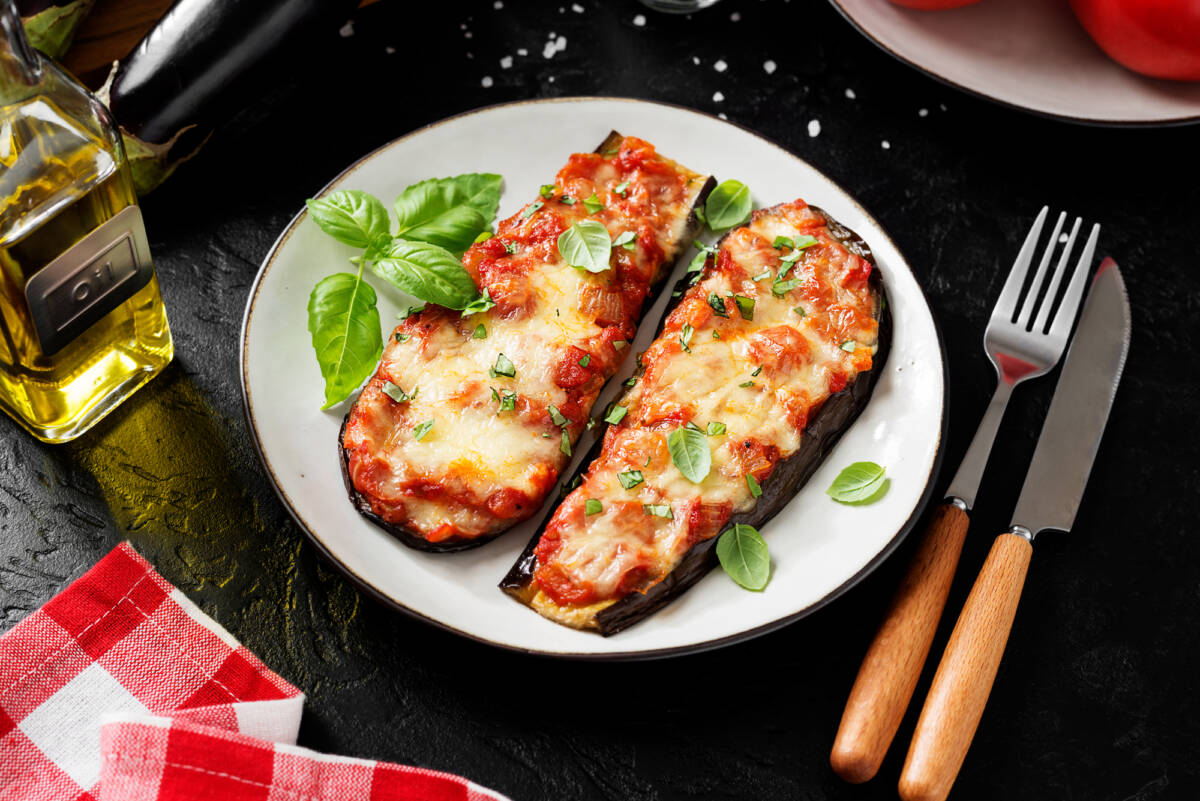 Melanzane con mozzarella e pomodorini pachino in friggitrice ad aria article-post