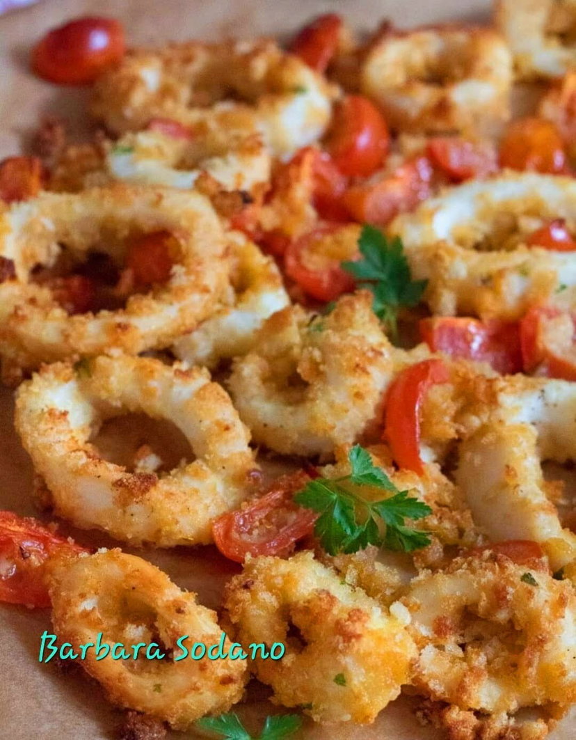 Calamari gratinati in friggitrice ad aria, aggiungi i pomodorini vedrai che delizia preview