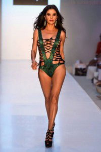 a model walks the runway at the A.Z Araujo show during Mercedes-Benz Fashion Week Swim 2015 at The Raleigh on July 21, 2014 in Miami Beach, Florida.